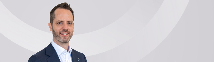 Photo of Brad Chapman with grey background