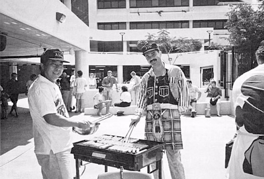 A staff barbeque was an informal part of the opening of the Chermside office in Brisbane.