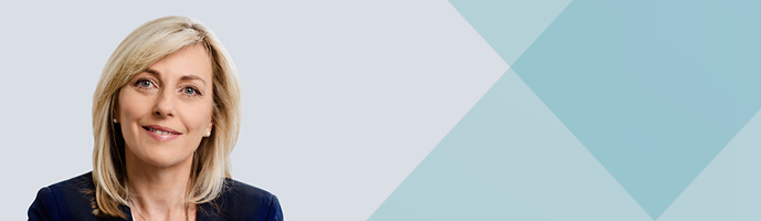 Photo of Jacqui Curtis with blue background