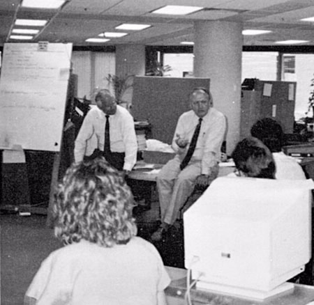 Trevor Boucher chatting with tax officers in 1989.
