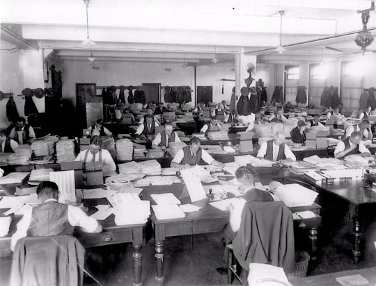 An assessing room during the 1920s.