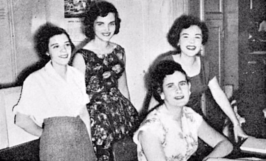 The first female assessors appointed to Sydney branch. Left to right: Joan Sneddon, Marie Taylor, Myrna Hallinan, with Jan Brady seated.