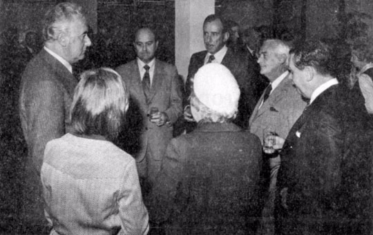 The official opening of the Parramatta branch. Prime Minister Gough Whitlam talks with Commissioner Sir Edward Cain, Lady Cain, Deputy Commissioner Ron Gray, Mr Shirlaw and H Forbes.